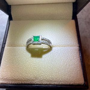 Emerald and diamonds size 7 ring.